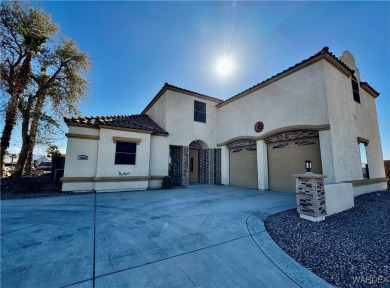 This spacious 2-story custom pool home in the gated Los Lagos on Los Lagos Golf Club in Arizona - for sale on GolfHomes.com, golf home, golf lot