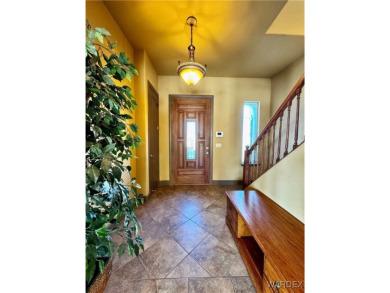 This spacious 2-story custom pool home in the gated Los Lagos on Los Lagos Golf Club in Arizona - for sale on GolfHomes.com, golf home, golf lot