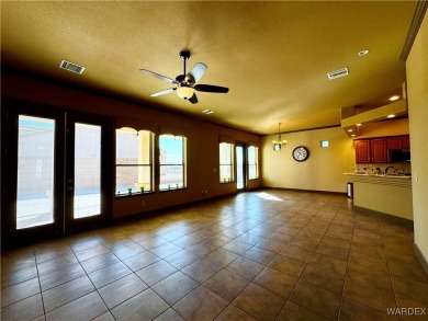 This spacious 2-story custom pool home in the gated Los Lagos on Los Lagos Golf Club in Arizona - for sale on GolfHomes.com, golf home, golf lot