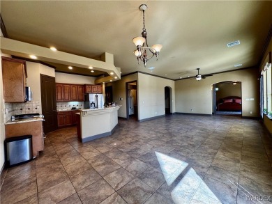 This spacious 2-story custom pool home in the gated Los Lagos on Los Lagos Golf Club in Arizona - for sale on GolfHomes.com, golf home, golf lot