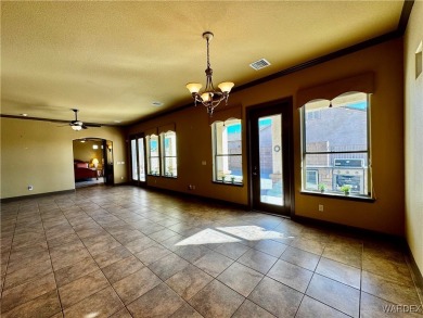 This spacious 2-story custom pool home in the gated Los Lagos on Los Lagos Golf Club in Arizona - for sale on GolfHomes.com, golf home, golf lot