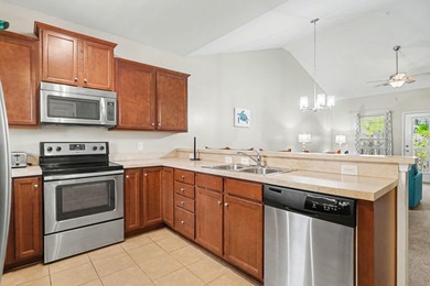 This furnished third-floor two-bedroom, two-bathroom condo is on Barefoot Resort and Golf Club  in South Carolina - for sale on GolfHomes.com, golf home, golf lot