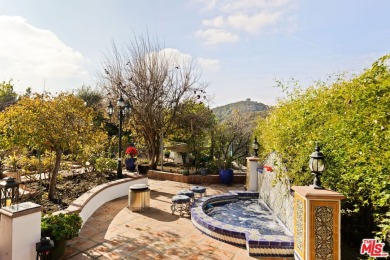 Welcome to your very own Mediterranean mountaintop retreat on Mountain Gate Country Club in California - for sale on GolfHomes.com, golf home, golf lot