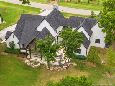 Experience contemporary luxury nestled on a .97-acre lot on The Patriot in Oklahoma - for sale on GolfHomes.com, golf home, golf lot