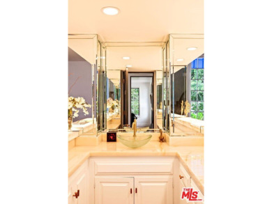 Welcome to your very own Mediterranean mountaintop retreat on Mountain Gate Country Club in California - for sale on GolfHomes.com, golf home, golf lot