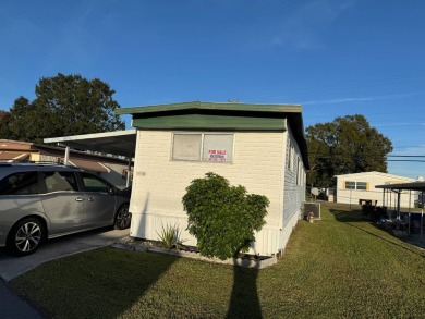 2bd/2b/Move-in Ready/Lot Rent $752  This two-bedroom, two-bath on Lone Palm Golf Club in Florida - for sale on GolfHomes.com, golf home, golf lot