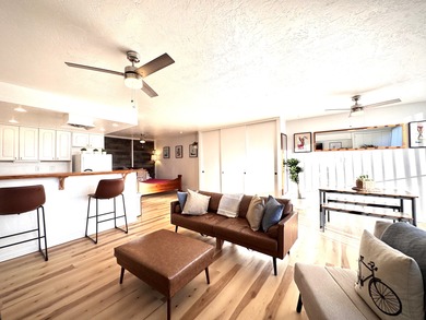 Beautifully furnished ground-floor corner unit located directly on Waikoloa Village Golf Club in Hawaii - for sale on GolfHomes.com, golf home, golf lot