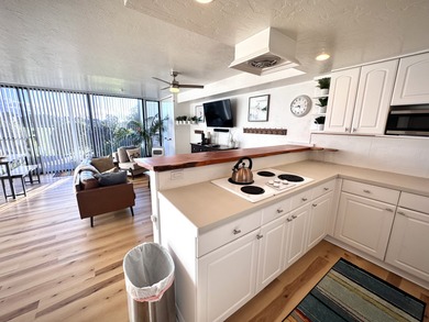 Beautifully furnished ground-floor corner unit located directly on Waikoloa Village Golf Club in Hawaii - for sale on GolfHomes.com, golf home, golf lot