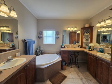 Leisure and Lifestyle await your arrival in beautiful Odessa on Silver Dollar Golf and Trap Club in Florida - for sale on GolfHomes.com, golf home, golf lot