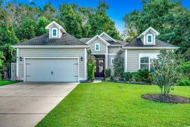 This beautifully landscaped home is a nature lovers paradise on Wachesaw Plantation East Golf Course in South Carolina - for sale on GolfHomes.com, golf home, golf lot