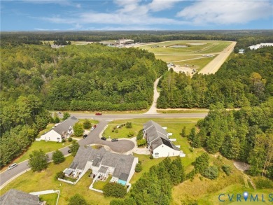 FIRST FLOOR PRIMARY BEDROOM...CHECK! MAINTENANCE FREE LIVING on The Tradition Golf Club At Royal New Kent in Virginia - for sale on GolfHomes.com, golf home, golf lot