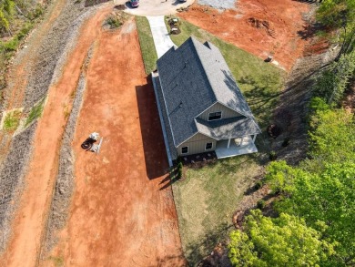 Exquisite new construction 3 bedroom/3 bathroom home located in on Woodfin Ridge Golf Club in South Carolina - for sale on GolfHomes.com, golf home, golf lot