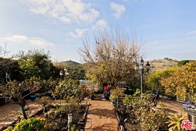 Welcome to your very own Mediterranean mountaintop retreat on Mountain Gate Country Club in California - for sale on GolfHomes.com, golf home, golf lot