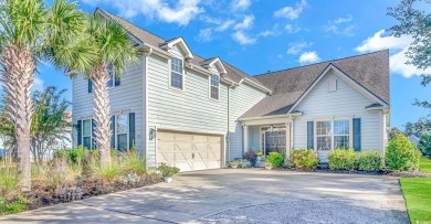 Welcome to this stunning home located in the prestigious gated on Surf Golf and Beach Club in South Carolina - for sale on GolfHomes.com, golf home, golf lot