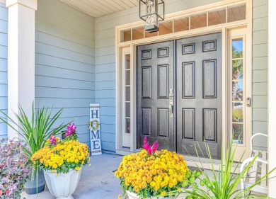 Welcome to this stunning home located in the prestigious gated on Surf Golf and Beach Club in South Carolina - for sale on GolfHomes.com, golf home, golf lot