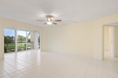WELCOME TO THIS SPARKLING, UPDATED CONDO WITH BEAUTIFUL GOLF & on Poinciana Golf Club in Florida - for sale on GolfHomes.com, golf home, golf lot
