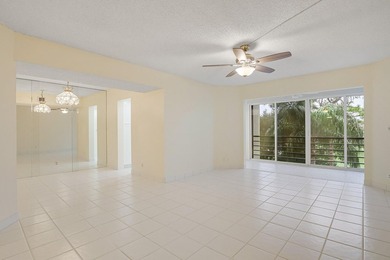 WELCOME TO THIS SPARKLING, UPDATED CONDO WITH BEAUTIFUL GOLF & on Poinciana Golf Club in Florida - for sale on GolfHomes.com, golf home, golf lot