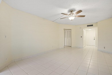 WELCOME TO THIS SPARKLING, UPDATED CONDO WITH BEAUTIFUL GOLF & on Poinciana Golf Club in Florida - for sale on GolfHomes.com, golf home, golf lot