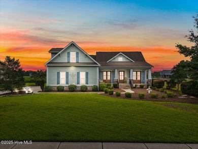 This stunning Creekside home offers front-row views of the on Crow Creek Golf Club in North Carolina - for sale on GolfHomes.com, golf home, golf lot