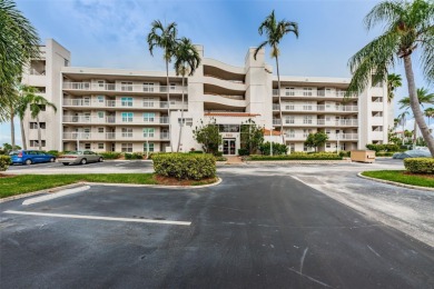 MILLION DOLLAR VIEW.. PRIVATE COMMUNITY BEACH.. FULLY UPDATED on Isla Del Sol Yacht and Country Club in Florida - for sale on GolfHomes.com, golf home, golf lot