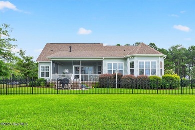This stunning Creekside home offers front-row views of the on Crow Creek Golf Club in North Carolina - for sale on GolfHomes.com, golf home, golf lot