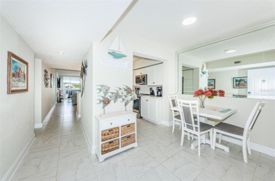 MILLION DOLLAR VIEW.. PRIVATE COMMUNITY BEACH.. FULLY UPDATED on Isla Del Sol Yacht and Country Club in Florida - for sale on GolfHomes.com, golf home, golf lot