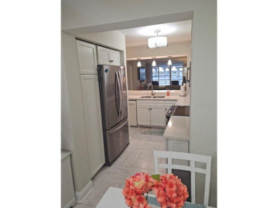 MILLION DOLLAR VIEW.. PRIVATE COMMUNITY BEACH.. FULLY UPDATED on Isla Del Sol Yacht and Country Club in Florida - for sale on GolfHomes.com, golf home, golf lot