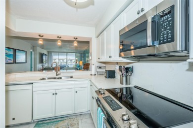 MILLION DOLLAR VIEW.. PRIVATE COMMUNITY BEACH.. FULLY UPDATED on Isla Del Sol Yacht and Country Club in Florida - for sale on GolfHomes.com, golf home, golf lot