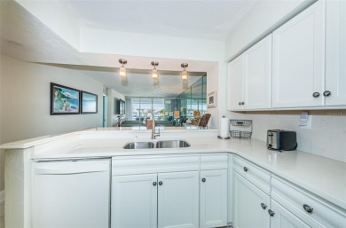 MILLION DOLLAR VIEW.. PRIVATE COMMUNITY BEACH.. FULLY UPDATED on Isla Del Sol Yacht and Country Club in Florida - for sale on GolfHomes.com, golf home, golf lot