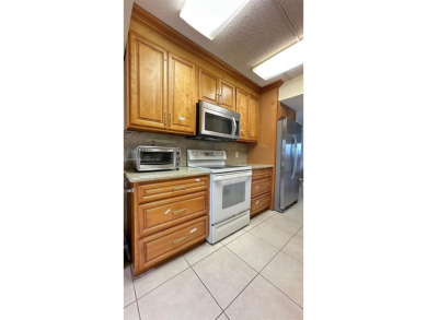A NICELY maintained 2 bed/2 bath WATER FRONT HOME, Featuring on Flamingo Lakes Country Club in Florida - for sale on GolfHomes.com, golf home, golf lot