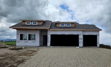 Brand new construction. Located in Hidden Bridge Ranch across on Hidden Bridge Golf Club in Wyoming - for sale on GolfHomes.com, golf home, golf lot