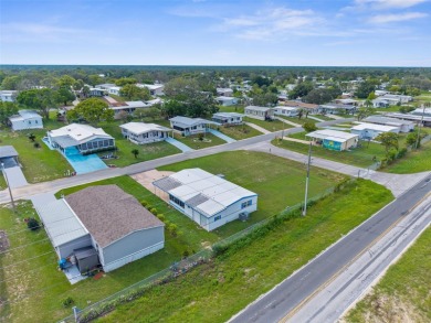 Beautifully Updated 3-Bedroom, 2-Bath Home with A Bonus Lot on High Point Golf Club, Inc. in Florida - for sale on GolfHomes.com, golf home, golf lot