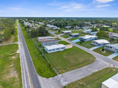 Beautifully Updated 3-Bedroom, 2-Bath Home with A Bonus Lot on High Point Golf Club, Inc. in Florida - for sale on GolfHomes.com, golf home, golf lot