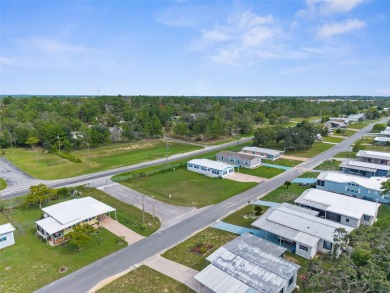 Beautifully Updated 3-Bedroom, 2-Bath Home with A Bonus Lot on High Point Golf Club, Inc. in Florida - for sale on GolfHomes.com, golf home, golf lot