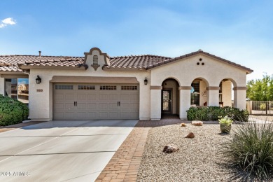 Custom lead glass entry sets the tone for this stunning duet on  in Arizona - for sale on GolfHomes.com, golf home, golf lot