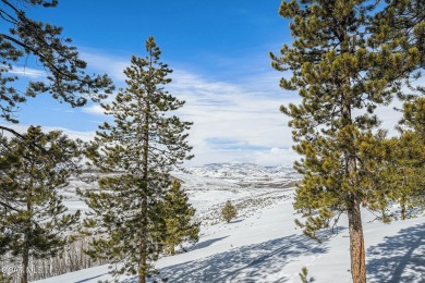 Nestled on the ridge with stunning views of open space, this on Headwaters Golf Course At Granby Ranch in Colorado - for sale on GolfHomes.com, golf home, golf lot