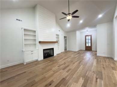 This home features beautiful woods floors throughout the home on Branchwood Golf Course in Arkansas - for sale on GolfHomes.com, golf home, golf lot