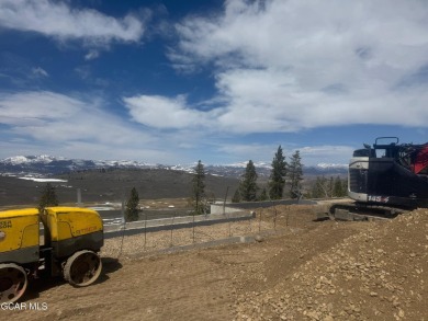 Nestled on the ridge with stunning views of open space, this on Headwaters Golf Course At Granby Ranch in Colorado - for sale on GolfHomes.com, golf home, golf lot