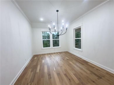 This home features beautiful woods floors throughout the home on Branchwood Golf Course in Arkansas - for sale on GolfHomes.com, golf home, golf lot