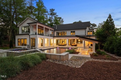 Experience the pinnacle of modern luxury living crafted by on North Ridge Country Club in North Carolina - for sale on GolfHomes.com, golf home, golf lot