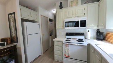 UPDATED SINGLE WIDE MOBILE HOME IN ACTIVE 55+ COMMUNITY! Stay on River Run Golf Links in Florida - for sale on GolfHomes.com, golf home, golf lot