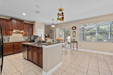 Welcome to luxury living in the highly sought-after, gated Eagle on Eagle Creek Golf Club in Florida - for sale on GolfHomes.com, golf home, golf lot