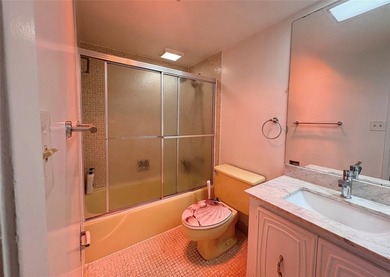 Experience spacious living in this 1BR/1.5BA condo in Palm Aire on Palm-Aire Country Club and Resort - Palms in Florida - for sale on GolfHomes.com, golf home, golf lot