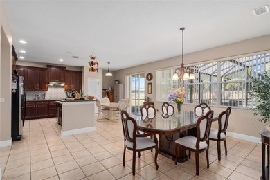 Welcome to luxury living in the highly sought-after, gated Eagle on Eagle Creek Golf Club in Florida - for sale on GolfHomes.com, golf home, golf lot