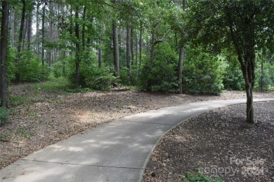 This Badin Lake water view lot is located in the prestigious on Old North State Club in North Carolina - for sale on GolfHomes.com, golf home, golf lot