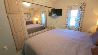 UPDATED SINGLE WIDE MOBILE HOME IN ACTIVE 55+ COMMUNITY! Stay on River Run Golf Links in Florida - for sale on GolfHomes.com, golf home, golf lot