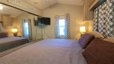 UPDATED SINGLE WIDE MOBILE HOME IN ACTIVE 55+ COMMUNITY! Stay on River Run Golf Links in Florida - for sale on GolfHomes.com, golf home, golf lot
