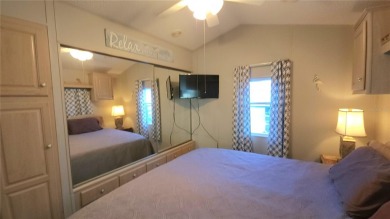 UPDATED SINGLE WIDE MOBILE HOME IN ACTIVE 55+ COMMUNITY! Stay on River Run Golf Links in Florida - for sale on GolfHomes.com, golf home, golf lot