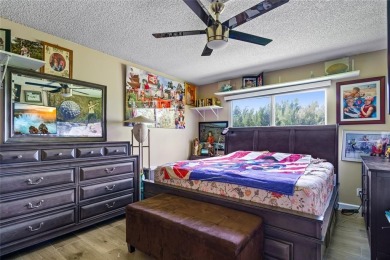 800 SW 125th Way 202 on Flamingo Lakes Country Club in Florida - for sale on GolfHomes.com, golf home, golf lot