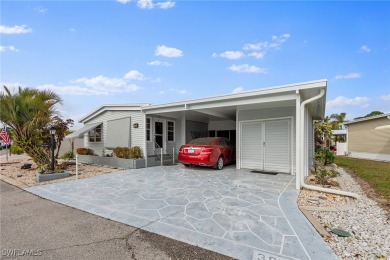 A nice-sized example of well cared for home in the premier on Six Lakes Country Club in Florida - for sale on GolfHomes.com, golf home, golf lot
